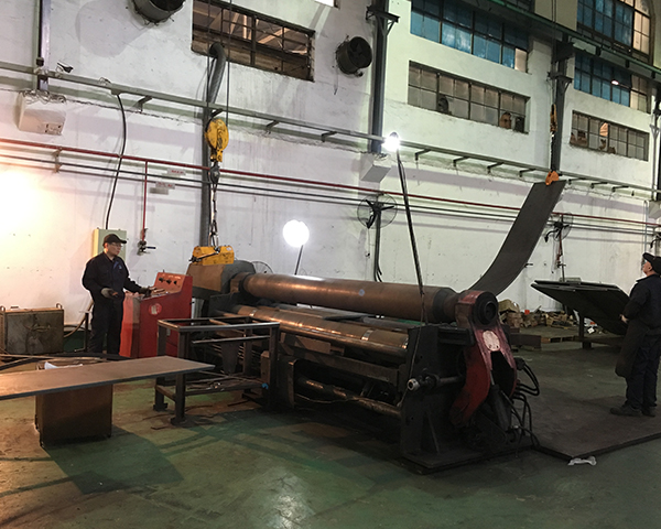 四轴卷圆机的工作原理