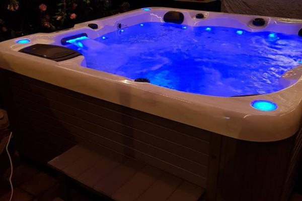 Twilight Serenity: Transforming a Backyard into a Nighttime Hot Tub Oasis