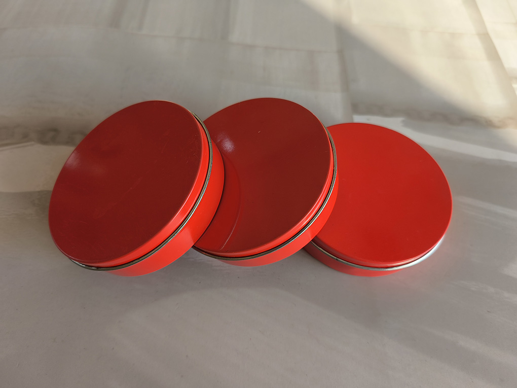 Discover the Versatility and Style of Our Red Small Round Tin
