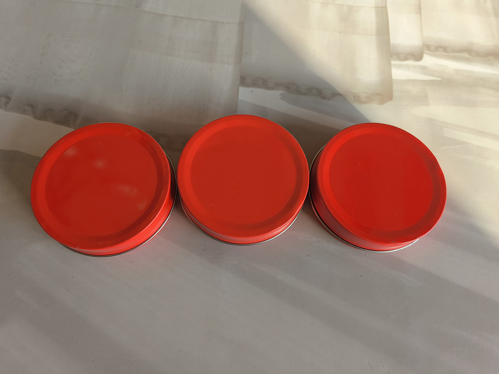 Discover the Versatility and Style of Our Red Small Round Tin