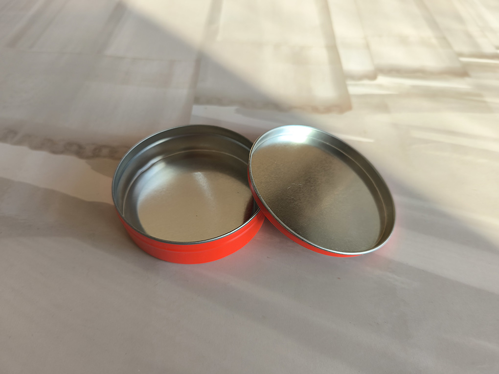 Discover the Versatility and Style of Our Red Small Round Tin