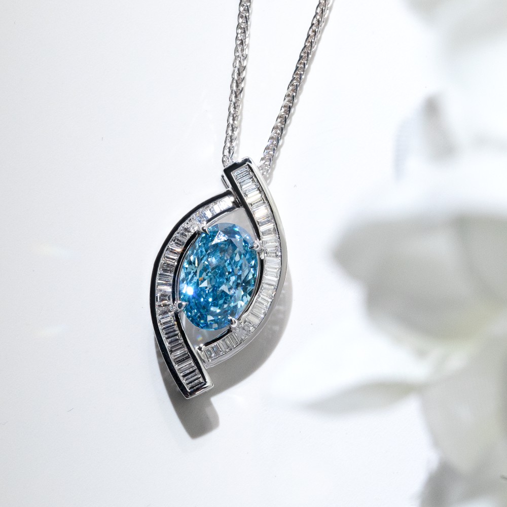 3.1ct oval blue diamond and 18K gold designer necklace