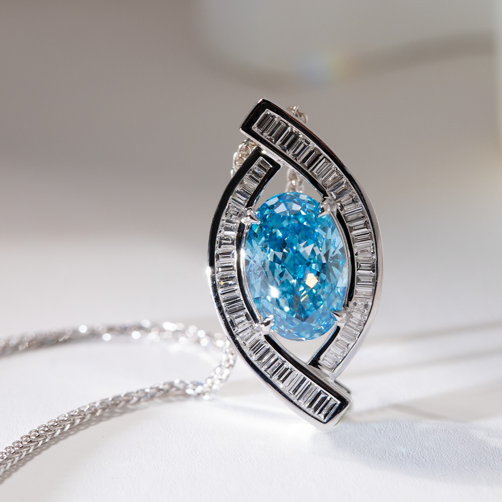 3.1ct oval blue diamond and 18K gold designer necklace