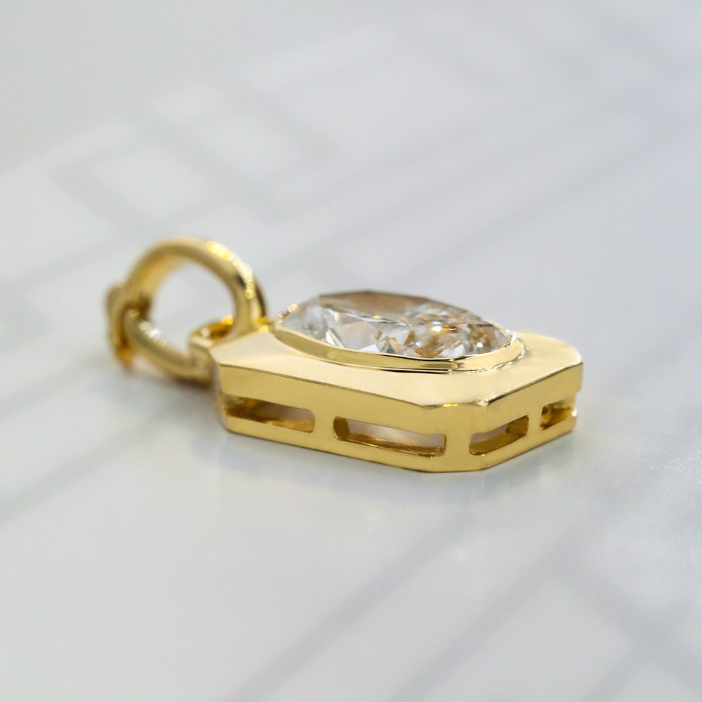 1.1ct oval diamond bezel-set 18K gold pendant