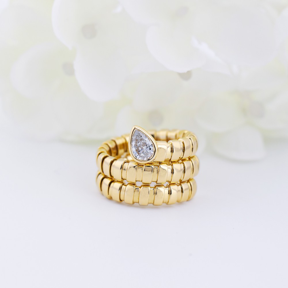Anillo de oro de 18 quilates con forma de hueso de serpiente y diamantes blancos en forma de gota de 0,8 ct