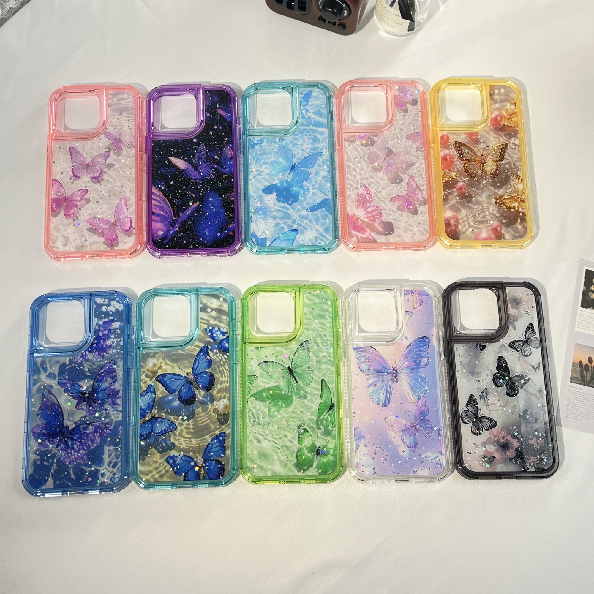 Exquisite Butterfly-Adorned Phone Cases for iPhone 16, 15, 14, 13, 12, 11