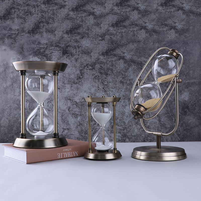 Metal hourglass brass