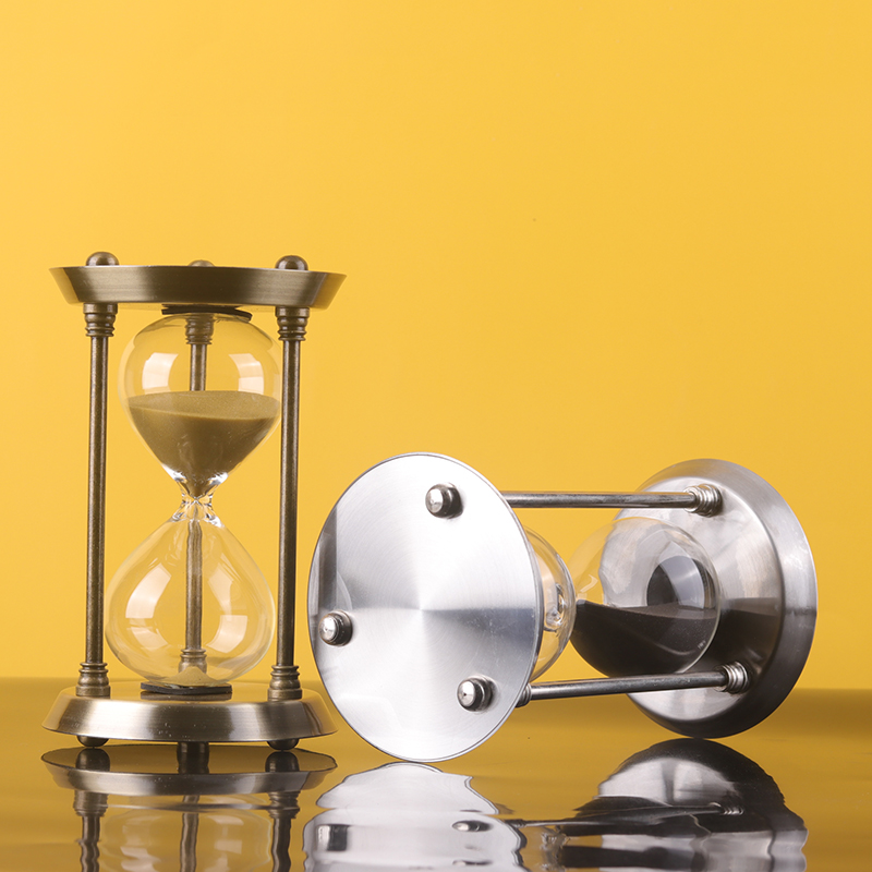 Metal hourglass brass
