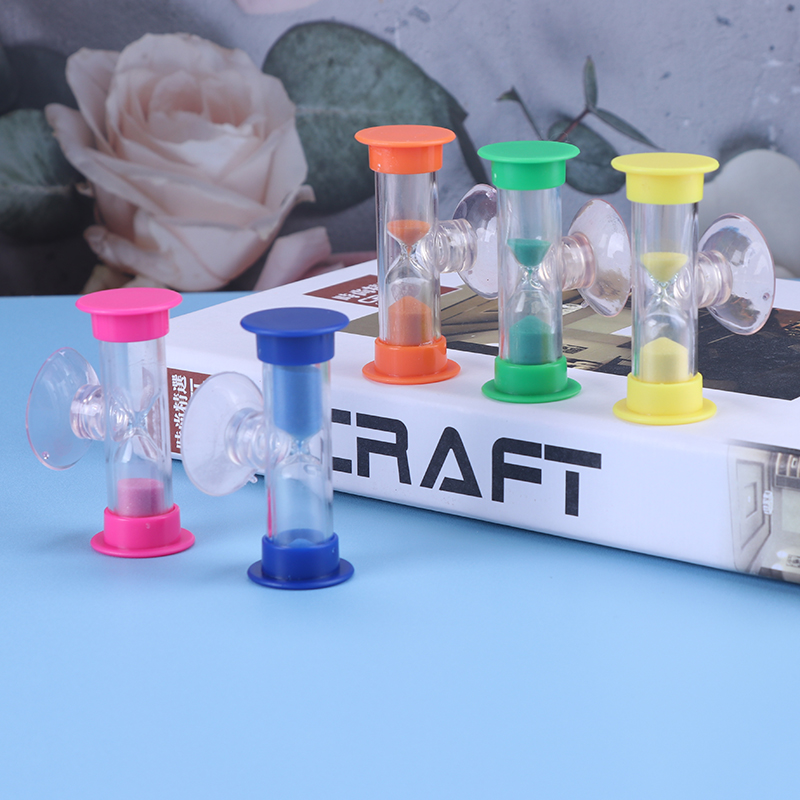 Sand timer with suction pad