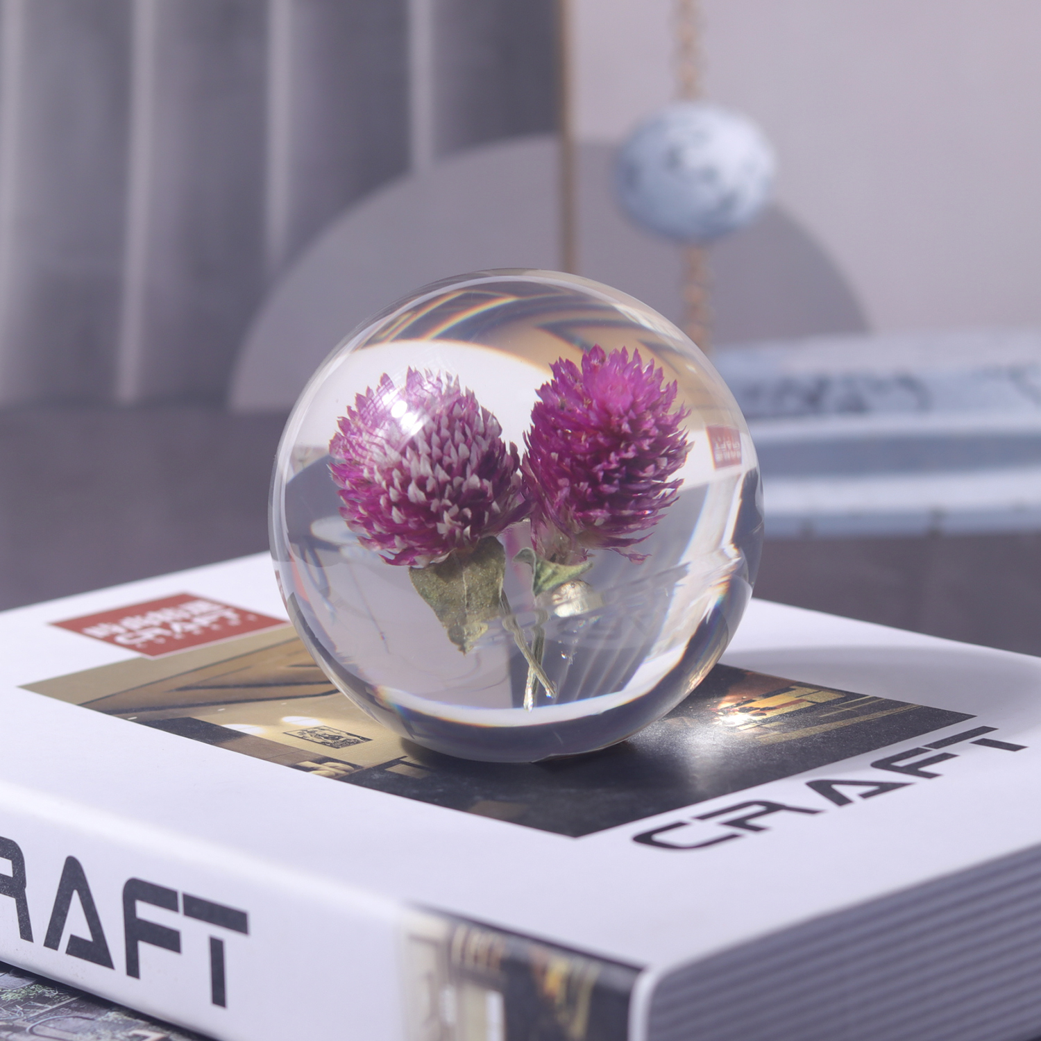 Resin sphere with inclusion of flowers