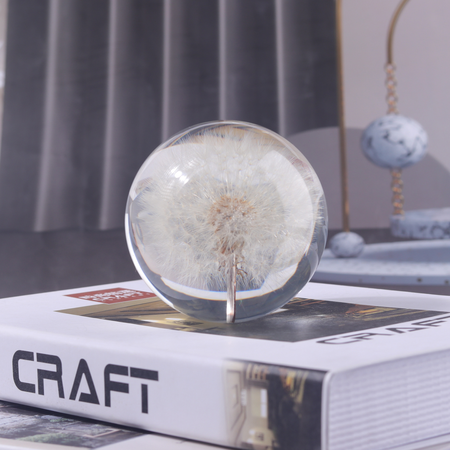 Resin sphere with inclusion of flowers