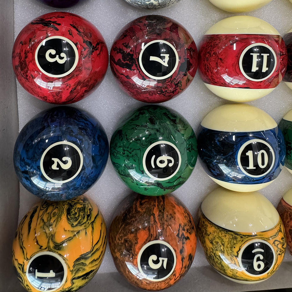 Marbleized billiard balls