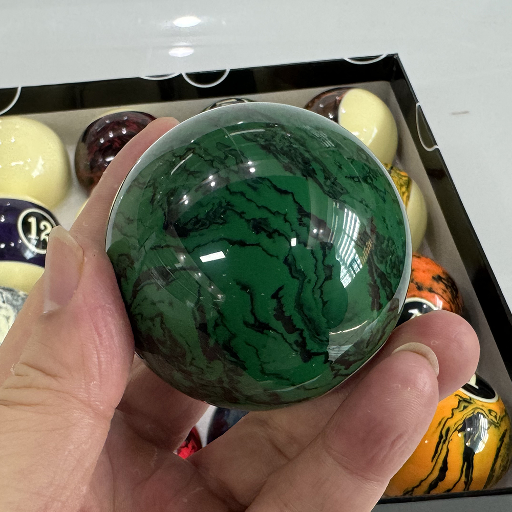 Marbleized billiard balls