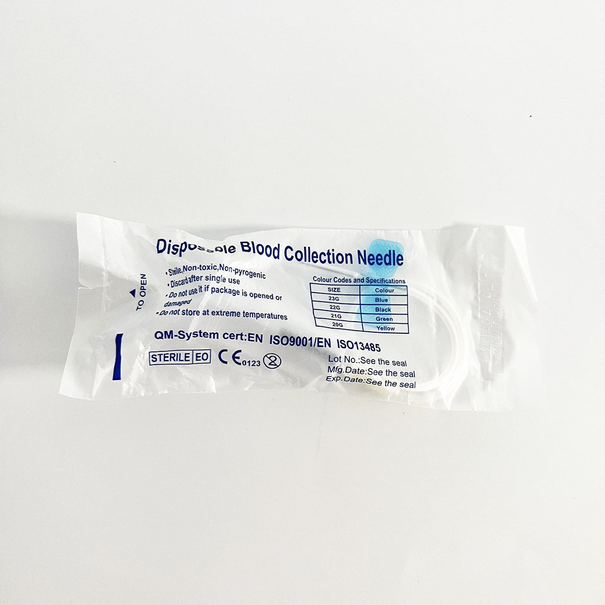 butterfly type blood collection needle with preattached holder