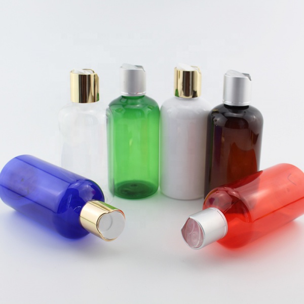PET Cosmo Round Plastic shampoo Bottles with gold silver disc press top