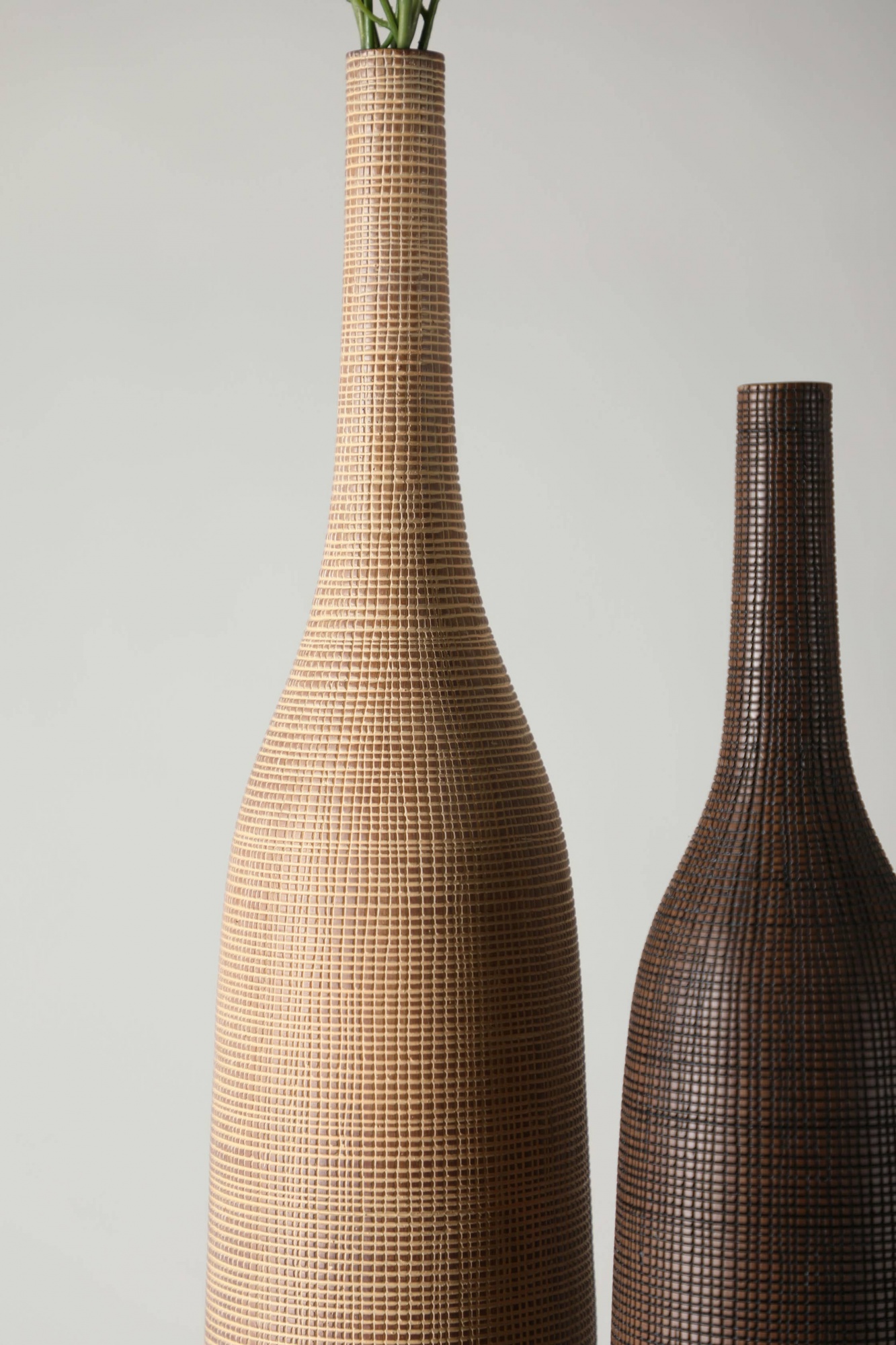 Another fine-grained long-neck African rattan style resin craft vase