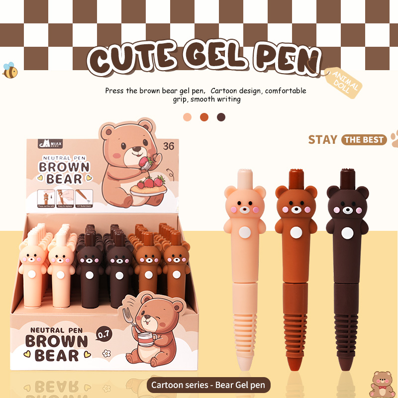 The three-color teddy bear presses the pen