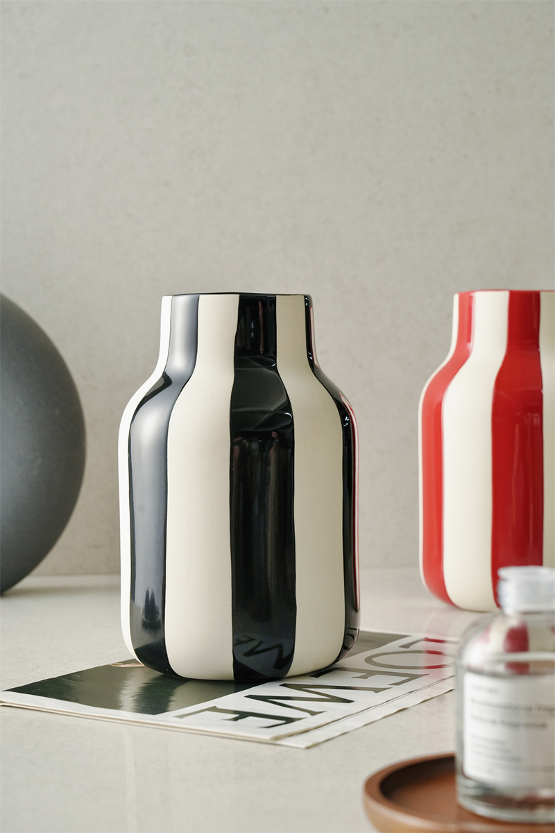 Black and white striped vase _ Red and white striped vase