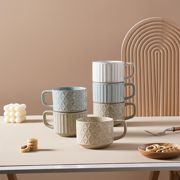 Ceramic material embossed colored cup