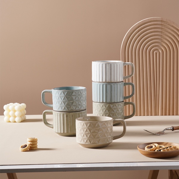 Ceramic material embossed colored cup