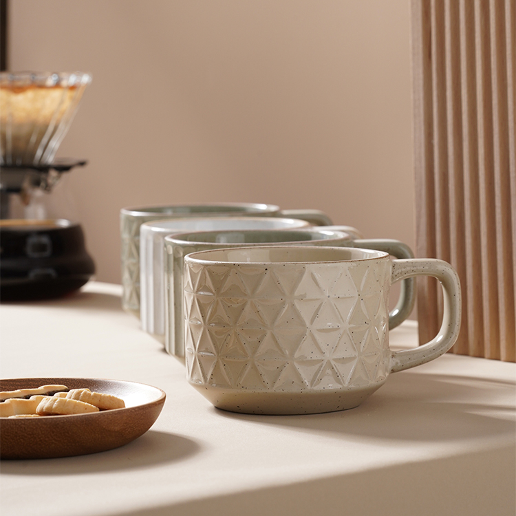 Ceramic material embossed colored cup
