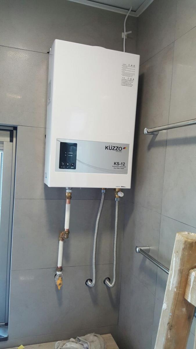 kuzzo 熱水爐 維修，駿弘電器維修你是的好助手