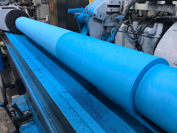 Precision grinding of rubber rollers