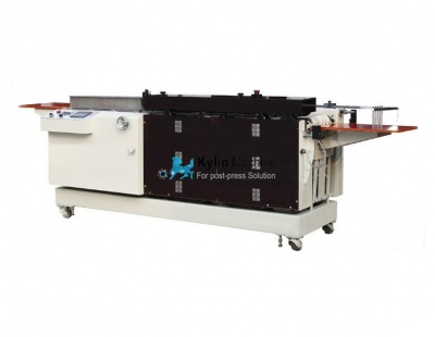 Book spine taping machine