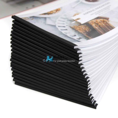 Book spine taping machine