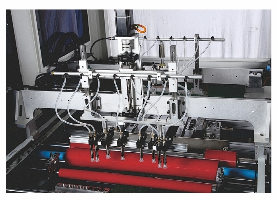 Automatic collapsible box wing making machine