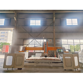 Watch our 5-axis bridge saw being loaded