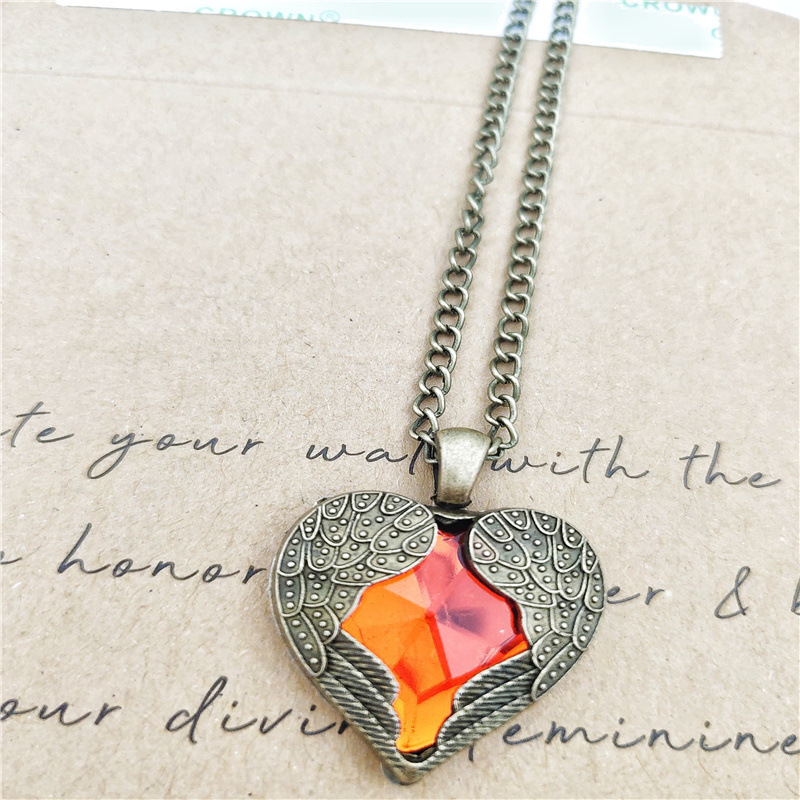 Trend angel wings red heart long sweater necklace palace style peach heart new women's neck decoration
