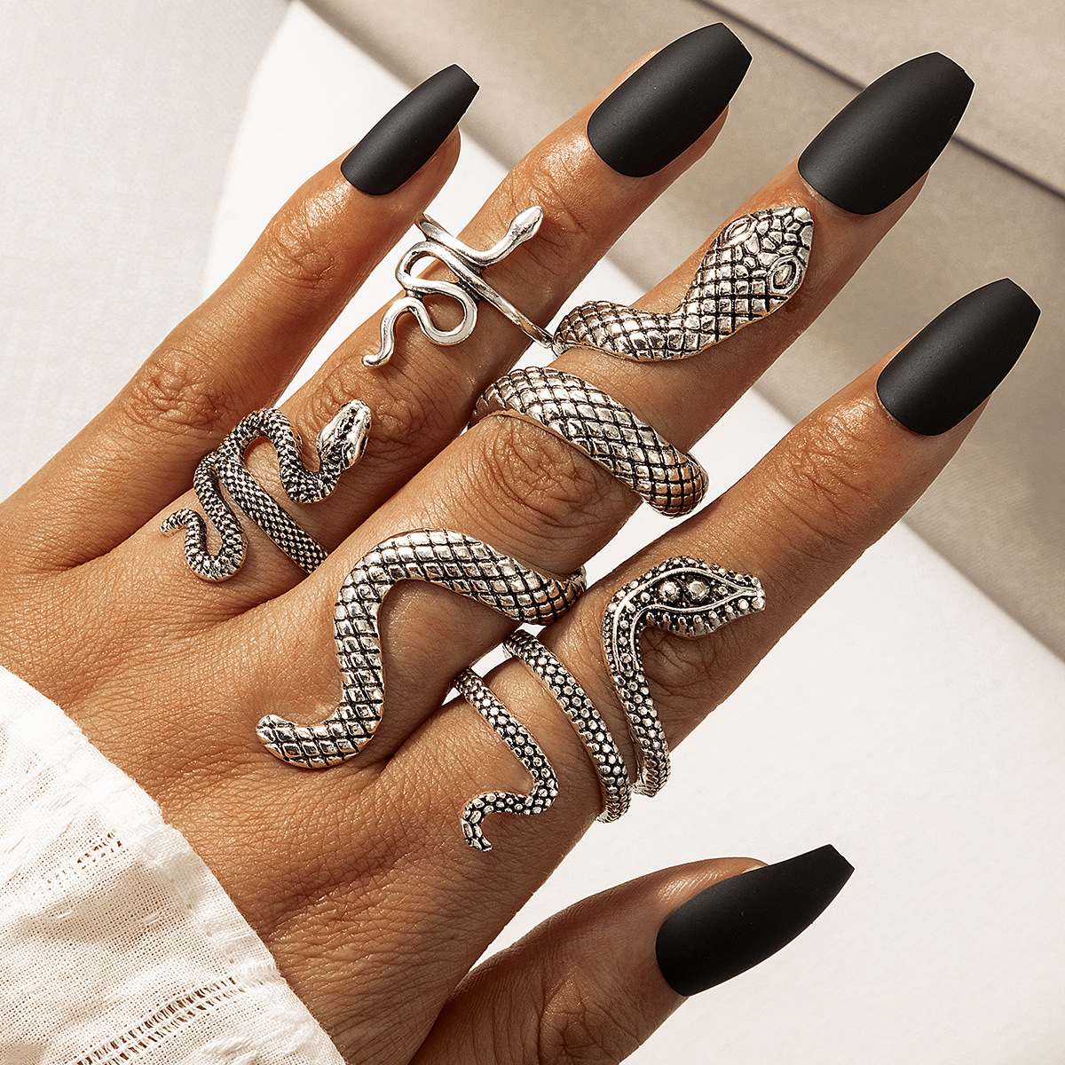 Serpentine ring Punk style Serpentine animal retro exaggerated four-piece ring set