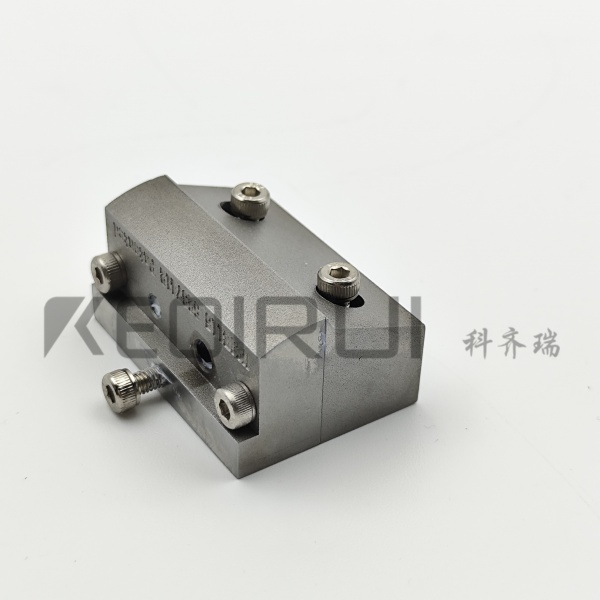 Hot melt adhesive nozzle scraper
