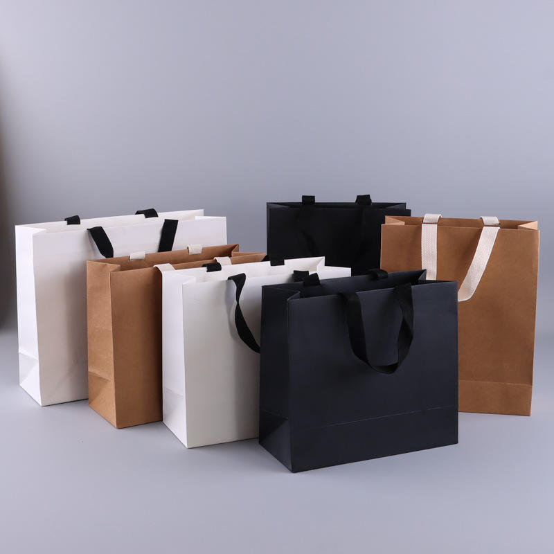OEM wholesale custom printed luxury shopping gift packaging clothing paper bag with your own logo for boutique