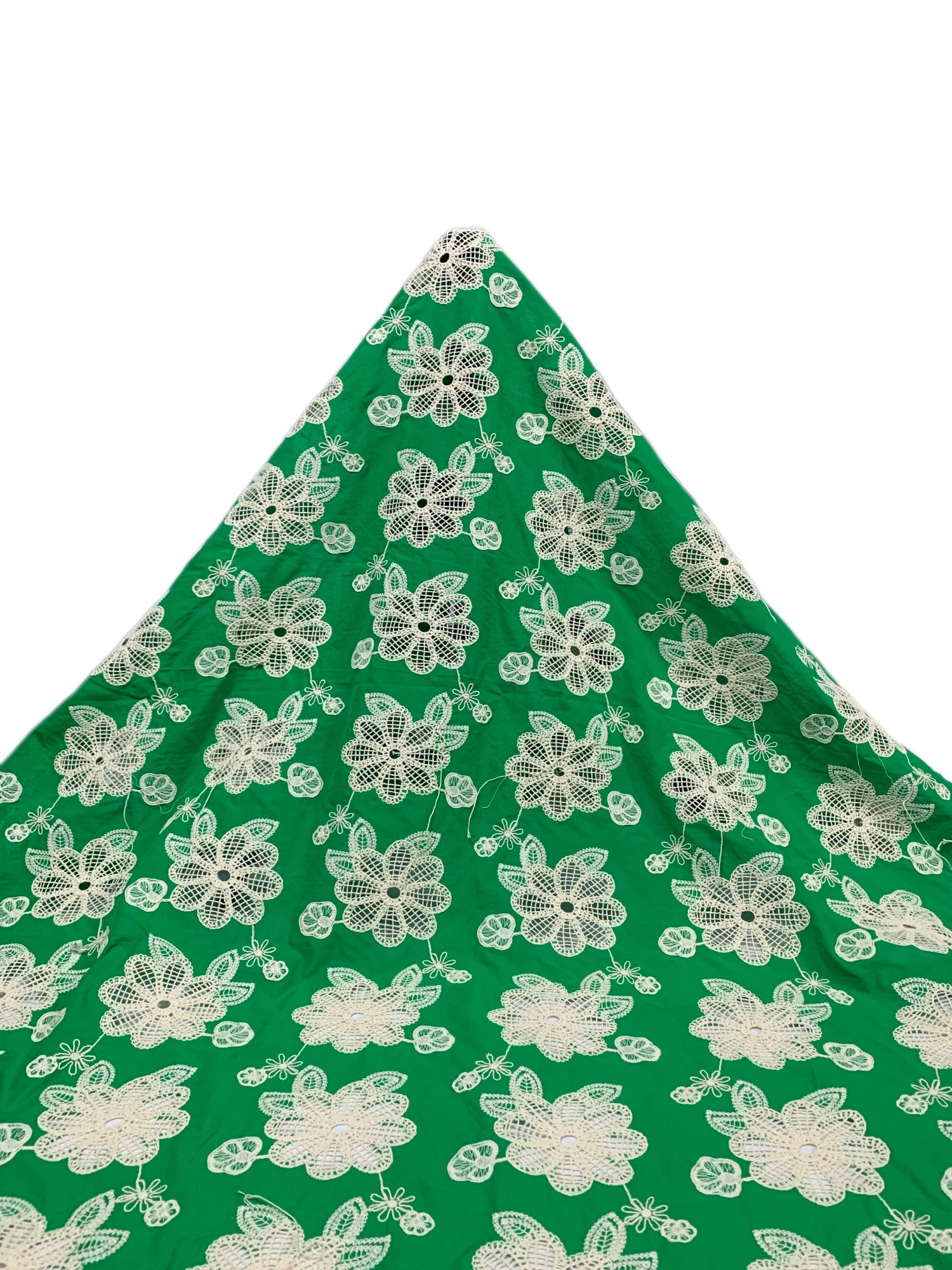 Green pure cotton fabric with daisy embroidery.