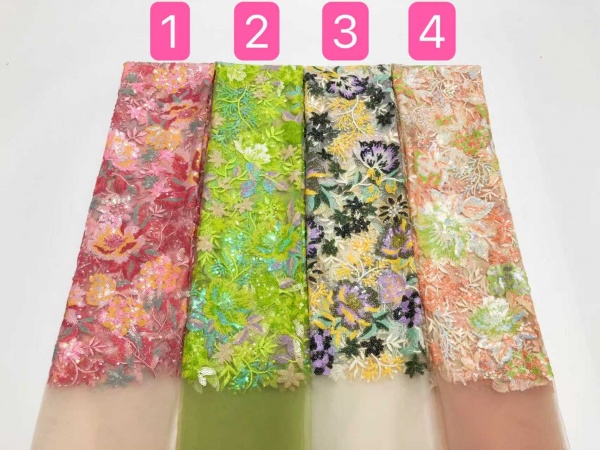 Lace, sequins, and embroidered floral fabric, used for skirts, wedding dresses, stage costumes, and special embellishments.