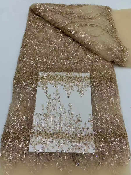 Sequined and embroidered fabrics -- used for sweet lace dresses, wedding gowns, and evening gowns.