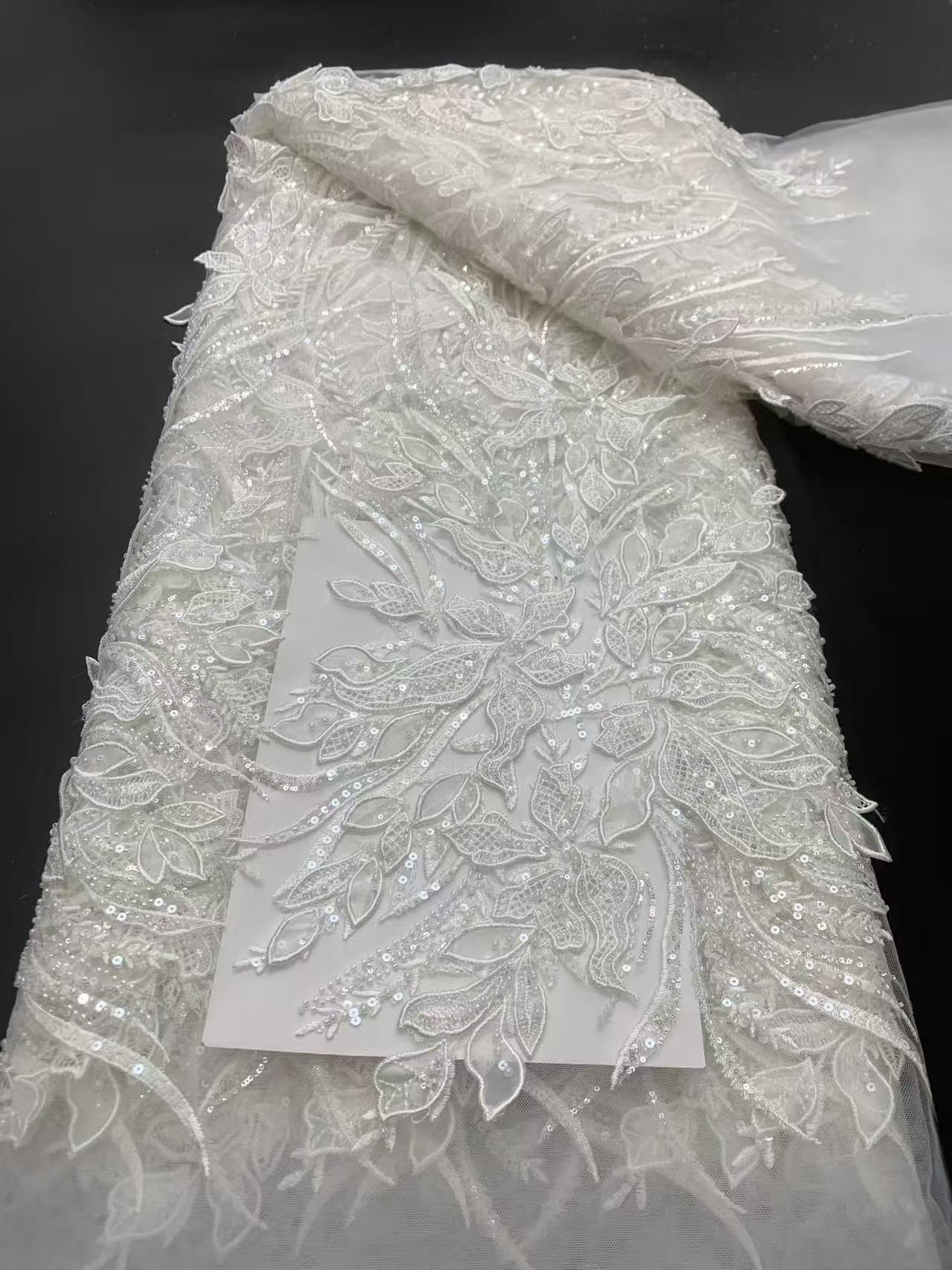 3D white floral sequin embroidered fabric -- suitable for sweet dresses, wedding dresses, stage costumes, and evening gowns.