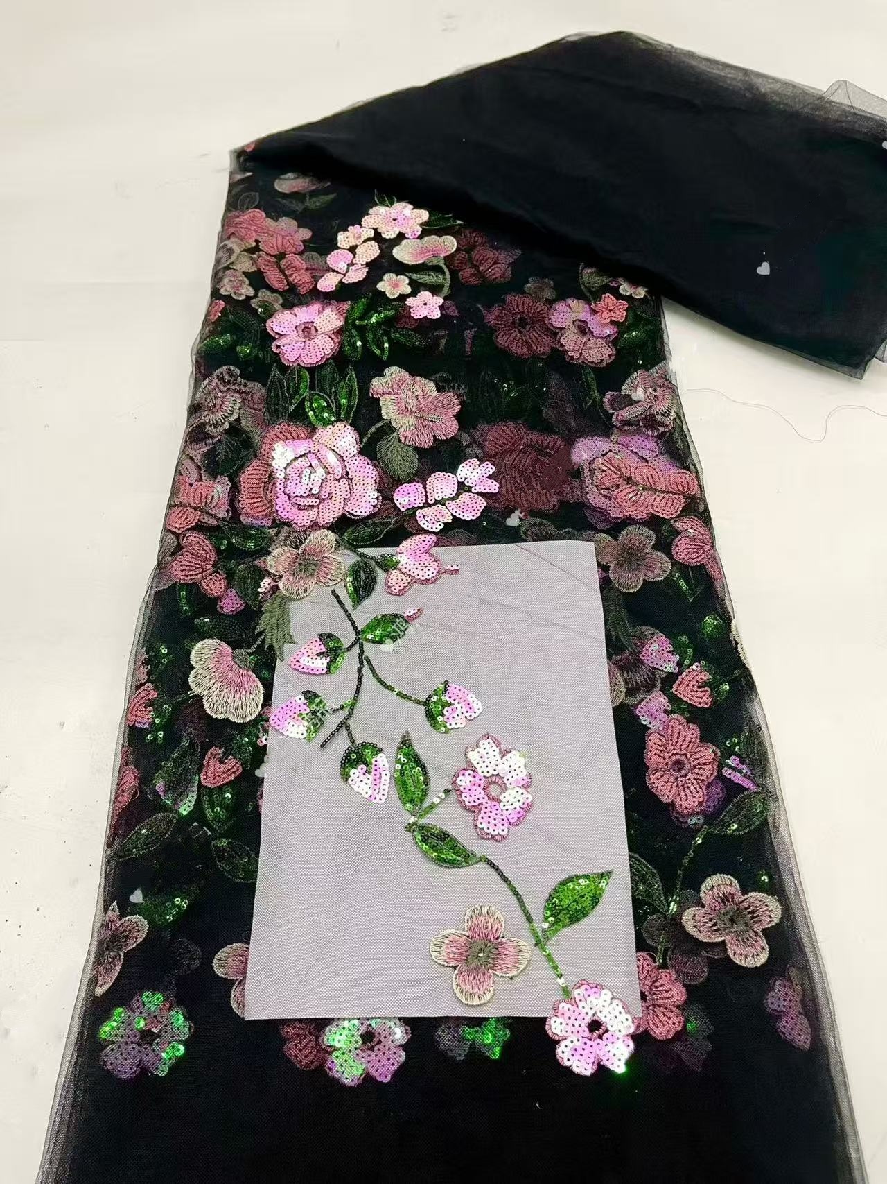 Black mesh fabric with colorful sequin embroidery -- suitable for sweet dresses, wedding dresses, evening gowns, stage costumes.