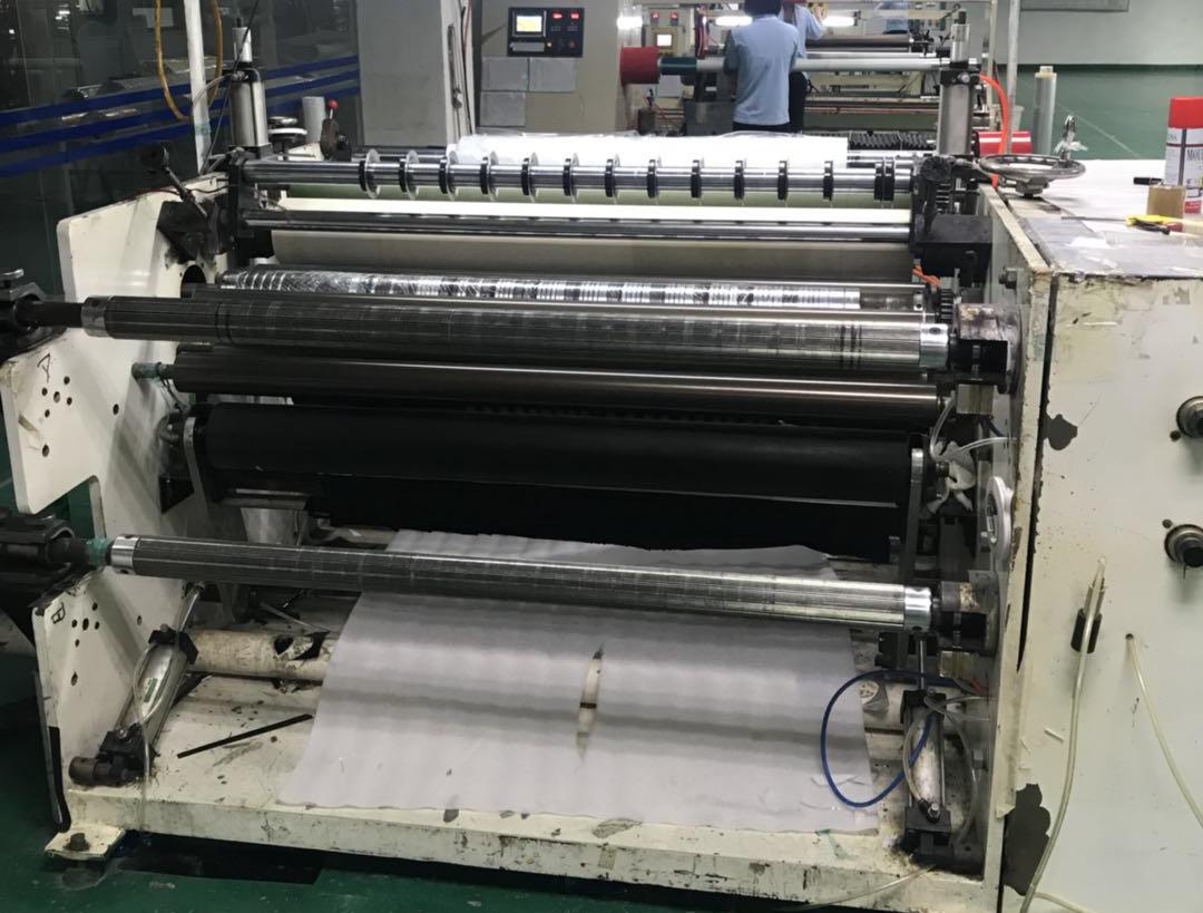Multifunctional slitting and laminating rewinding 