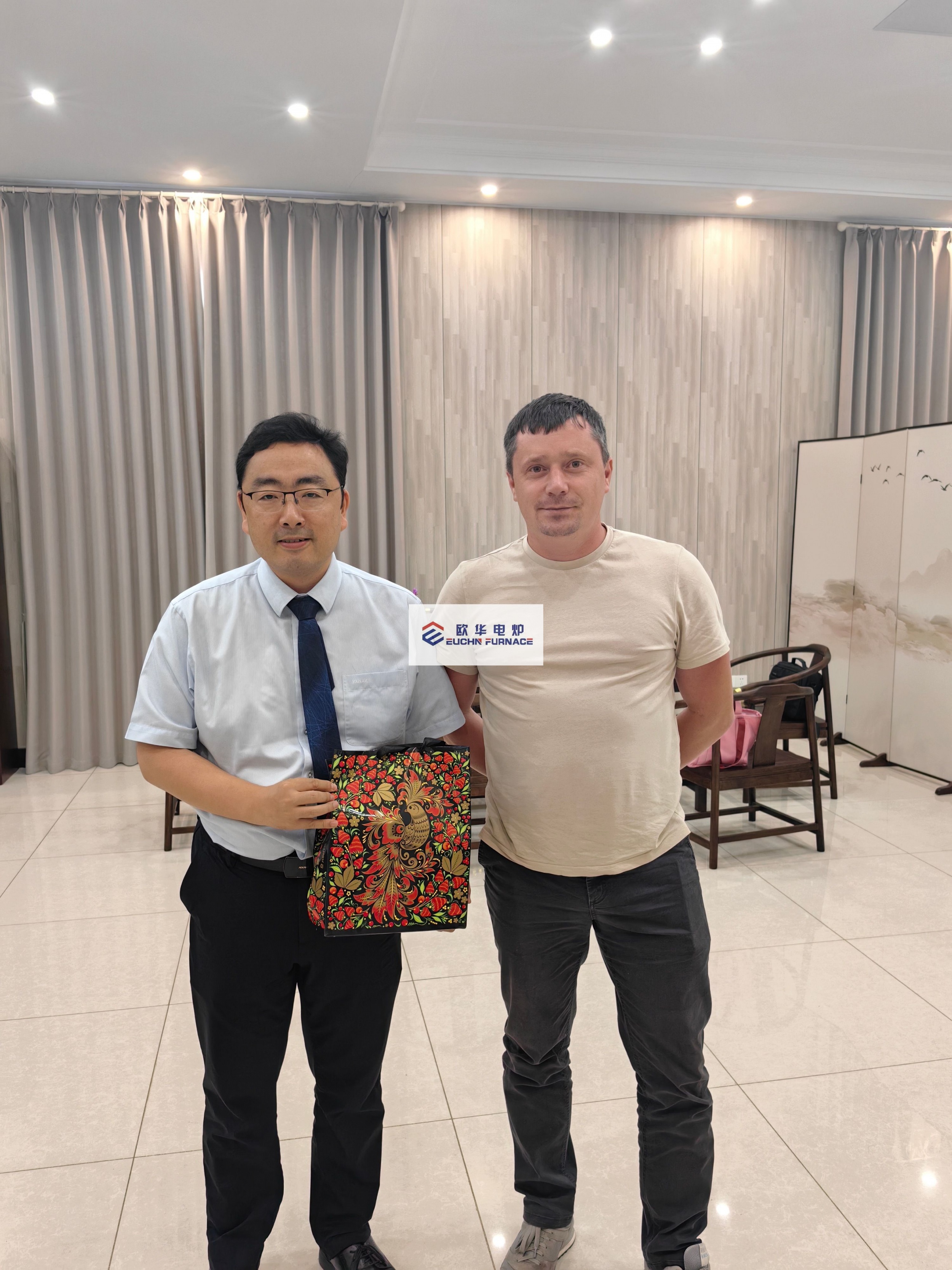 Warmly welcome customers from Novosibirsk, Russia to visit our factory to review the quenching furnace drawings and production situation